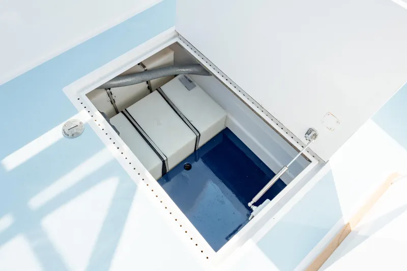  Yacht Photos Pics Open storage compartment in 2019 Gamefisherman 26 Cuddy Cabin boat.