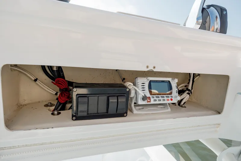  Yacht Photos Pics Electronics compartment of 2019 Gamefisherman 26 Cuddy Cabin boat.