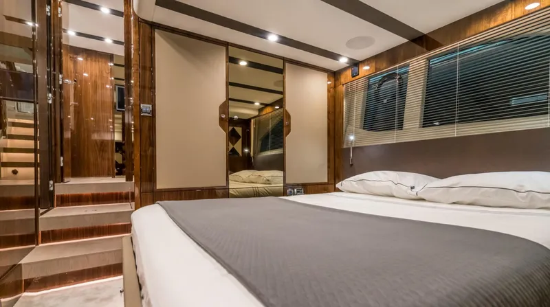  Yacht Photos Pics Luxurious interior of 2026 Fairline Targa 45 Open yacht bedroom.