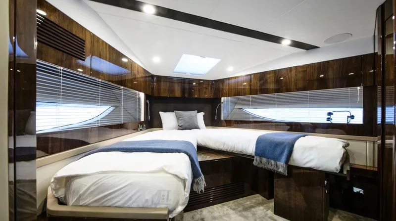  Yacht Photos Pics Luxurious cabin interior of 2026 Fairline Targa 45 Open yacht with twin beds.