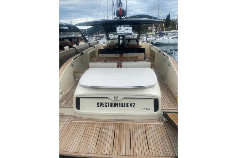  Yacht Photos Pics 2024 Invictus TT 420 yacht, Spectrum Blue 42, docked at marina.