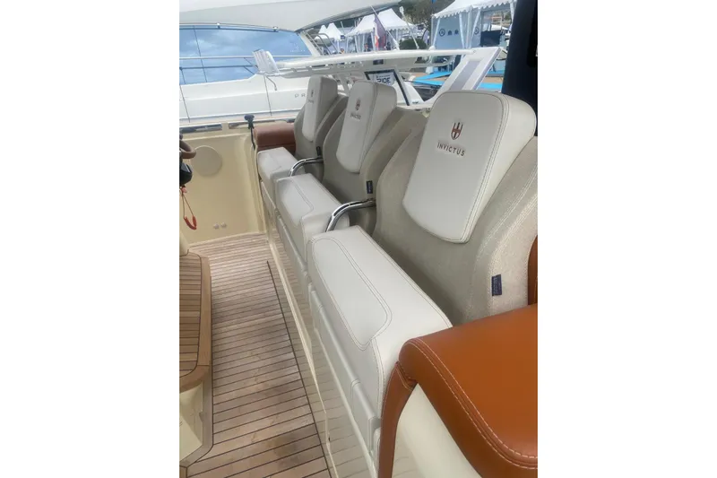  Yacht Photos Pics 2024 Invictus TT 420 boat interior with luxurious seating and elegant design.