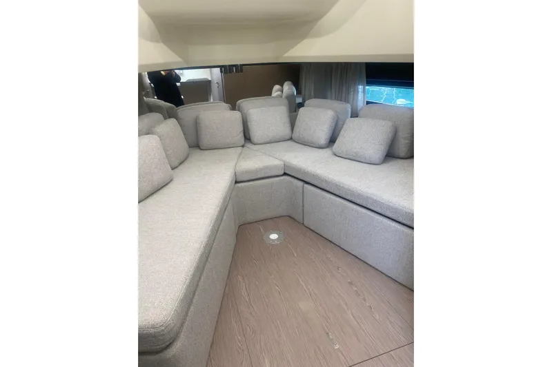  Yacht Photos Pics Luxurious interior seating of 2024 Invictus TT 420 yacht with plush cushions.