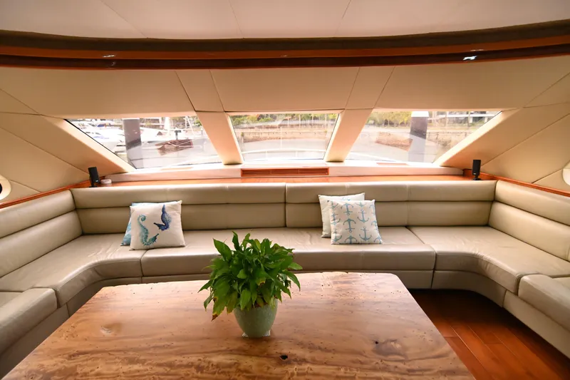  Yacht Photos Pics Luxurious interior of 2014 Accelera 82 yacht with plush seating and decorative pillows.