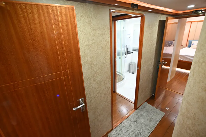  Yacht Photos Pics Hallway in 2014 Accelera 82 yacht with wooden doors and modern bathroom.