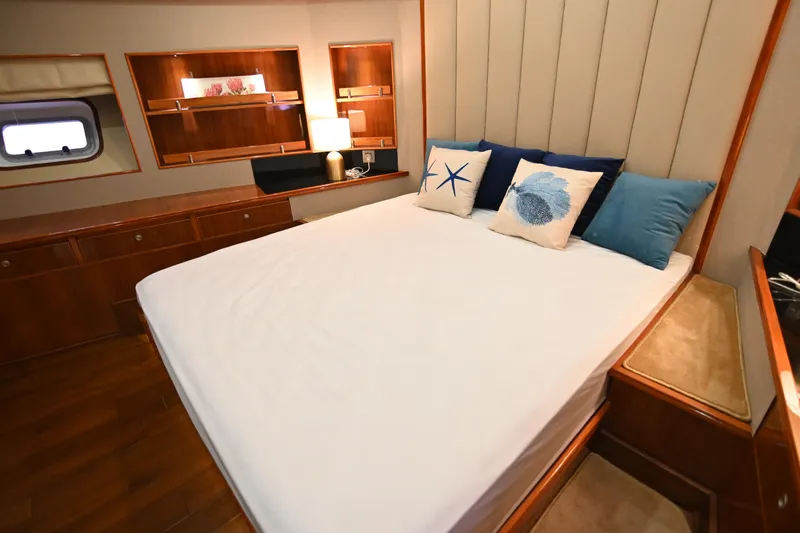  Yacht Photos Pics Luxurious bedroom interior on 2014 Accelera 82 yacht with elegant bedding and decor.