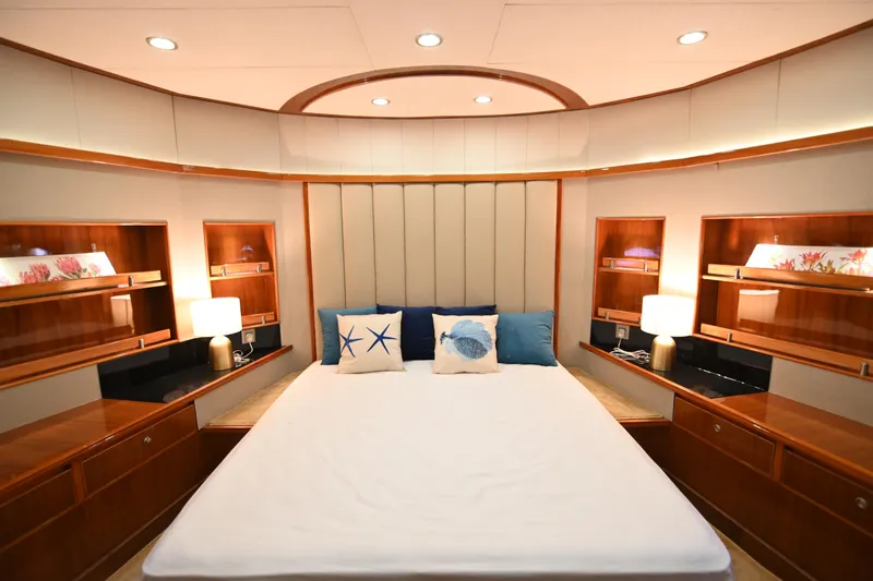  Yacht Photos Pics Luxurious bedroom interior on 2014 Accelera 82 yacht with elegant wood finishes.