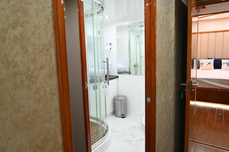  Yacht Photos Pics Luxurious yacht interior with modern bathroom and cozy bedroom, Accelera 82, 2014 model.