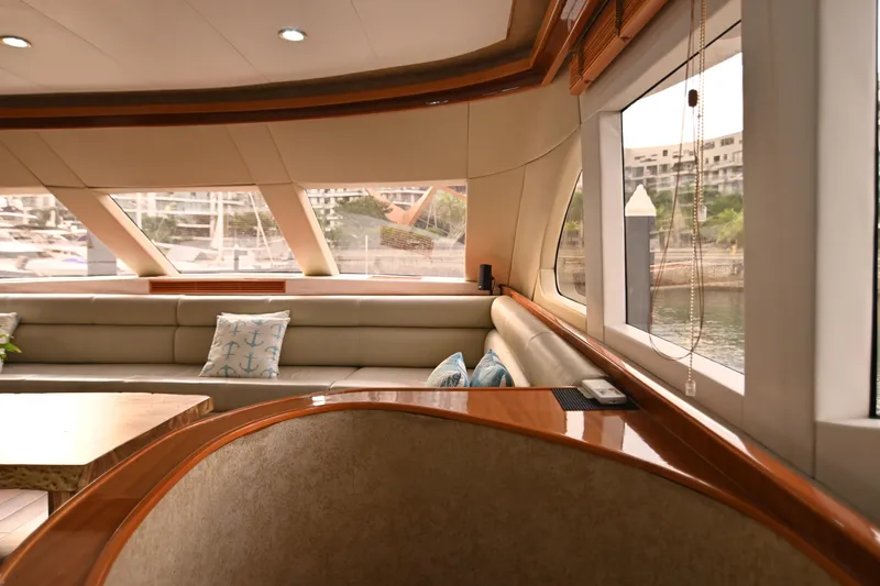  Yacht Photos Pics Luxurious interior of 2014 Accelera 82 yacht with elegant seating and large windows.