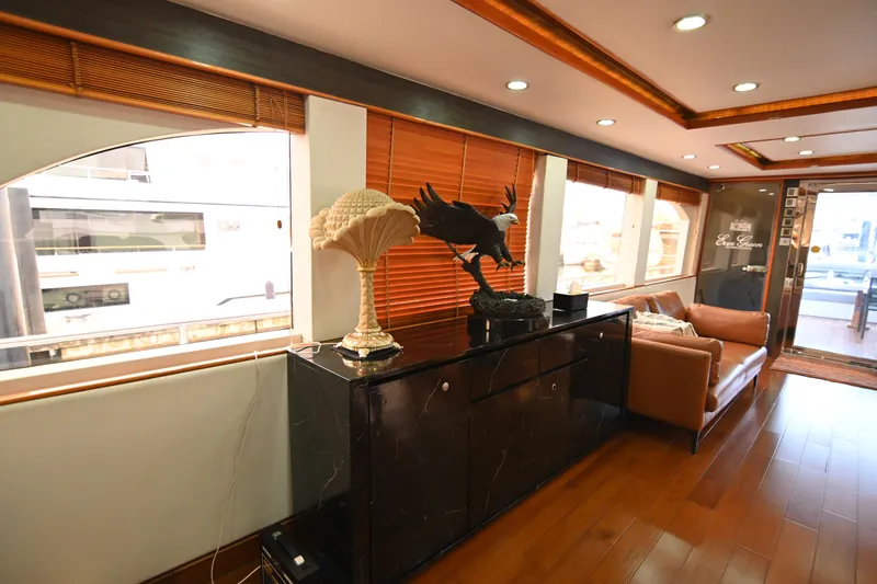  Yacht Photos Pics Luxurious yacht interior with elegant decor, featuring a sculpture and comfortable seating. Accelera 82, 2014.