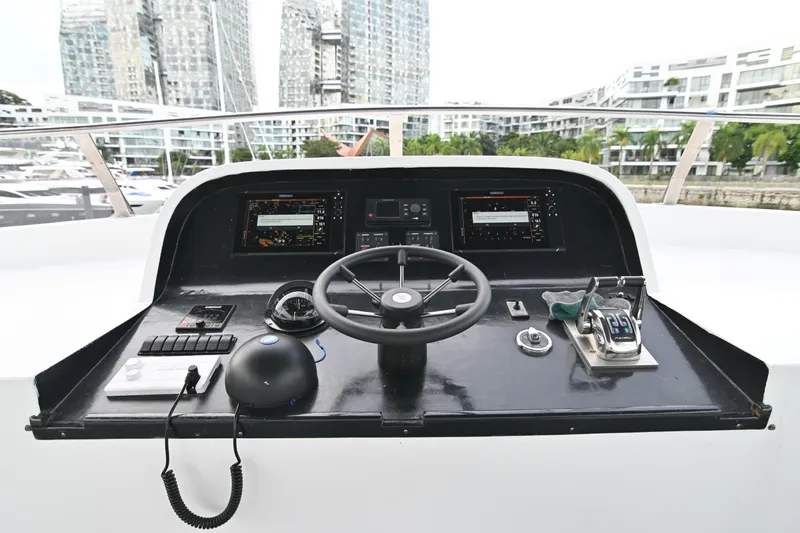  Yacht Photos Pics Control panel of a 2014 Accelera 82 yacht with modern navigation equipment.