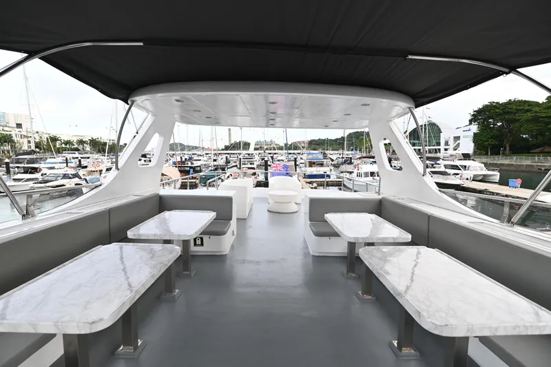  Yacht Photos Pics Luxurious 2014 Accelera 82 yacht interior with marble tables and marina view.