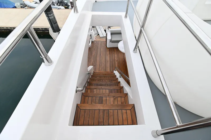  Yacht Photos Pics Staircase on 2014 Accelera 82 yacht with wooden steps and sleek design.