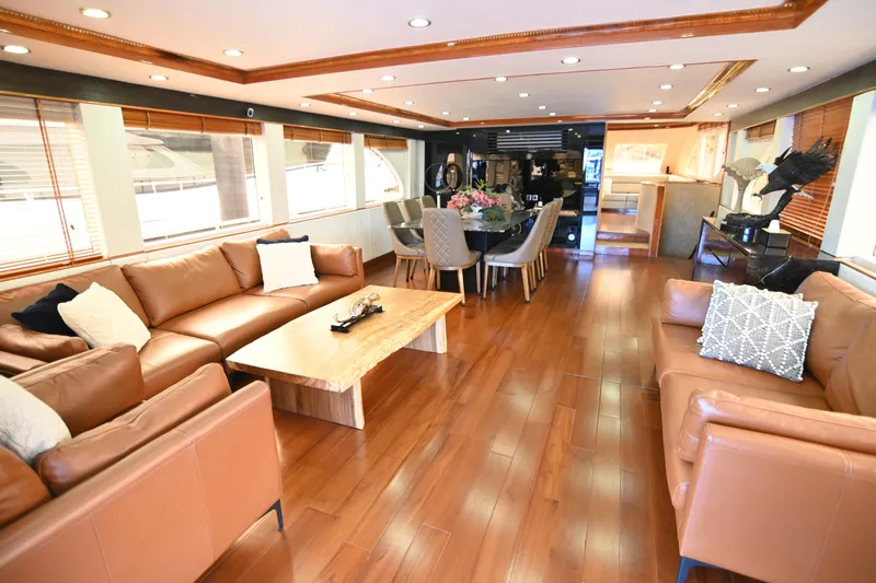  Yacht Photos Pics Luxurious interior of 2014 Accelera 82 yacht with leather sofas and elegant dining area.