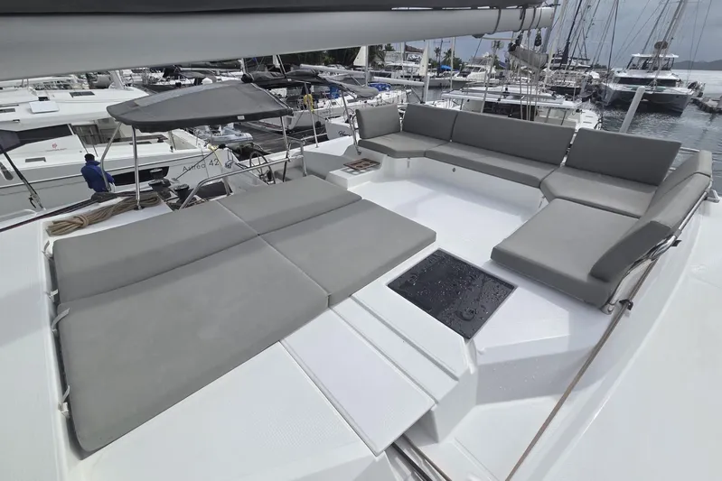 Free To Be Yacht Photos Pics Luxurious 2022 Fountaine Pajot Elba 45 Catamaran with spacious outdoor seating area.