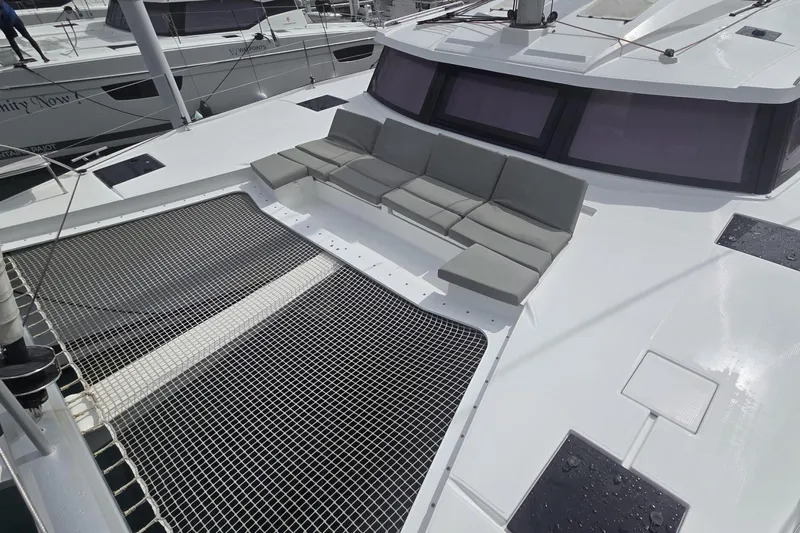 Free To Be Yacht Photos Pics 2022 Fountaine Pajot Elba 45 Catamaran with spacious deck and comfortable seating area.