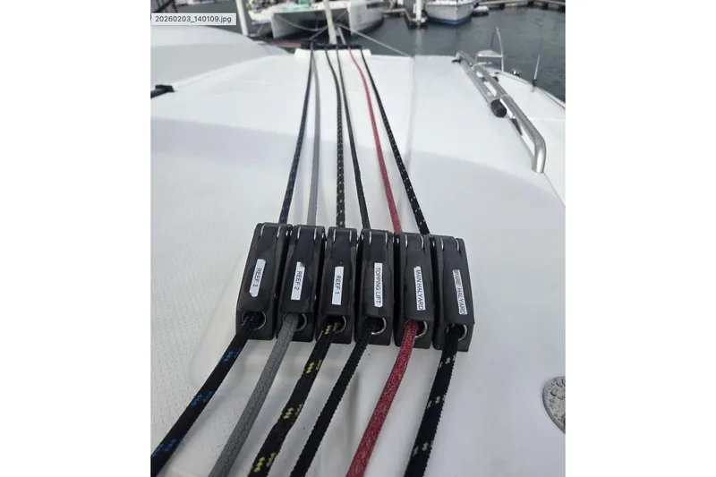 Free To Be Yacht Photos Pics Rope clutches on 2022 Fountaine Pajot Elba 45 Catamaran deck, labeled for sail control.