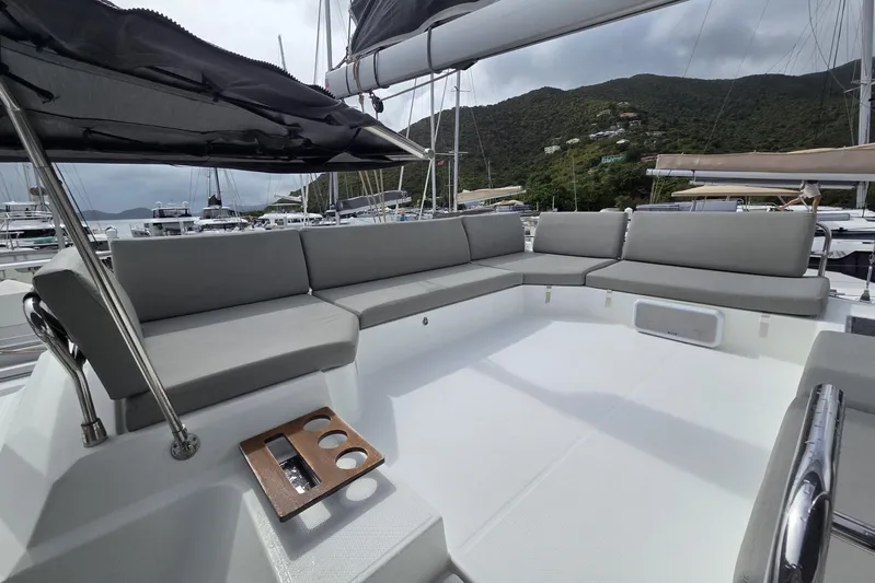 Free To Be Yacht Photos Pics Spacious deck of 2022 Fountaine Pajot Elba 45 Catamaran with comfortable seating.