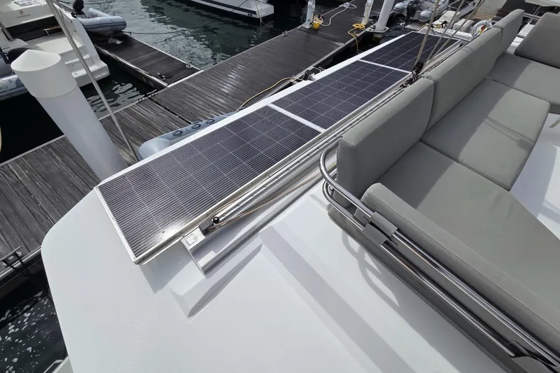 Free To Be Yacht Photos Pics 2022 Fountaine Pajot Elba 45 Catamaran with solar panels and seating on deck.