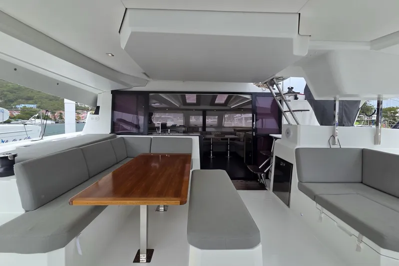 Free To Be Yacht Photos Pics 2022 Fountaine Pajot Elba 45 Catamaran interior with spacious seating and dining area.