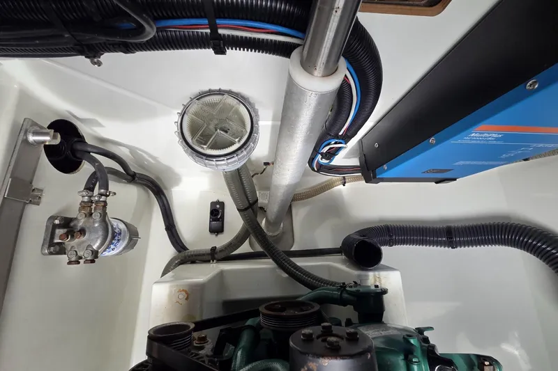 Free To Be Yacht Photos Pics Engine compartment of 2022 Fountaine Pajot Elba 45 Catamaran with visible wiring and components.