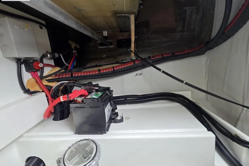 Free To Be Yacht Photos Pics 2022 Fountaine Pajot Elba 45 Catamaran engine compartment with battery and wiring.