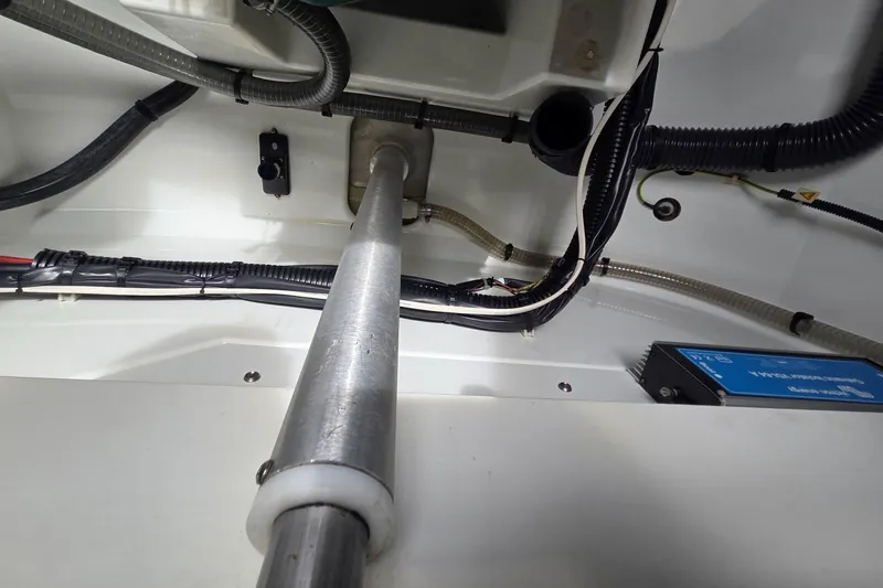 Free To Be Yacht Photos Pics Interior view of 2022 Fountaine Pajot Elba 45 Catamaran's mechanical components and wiring.