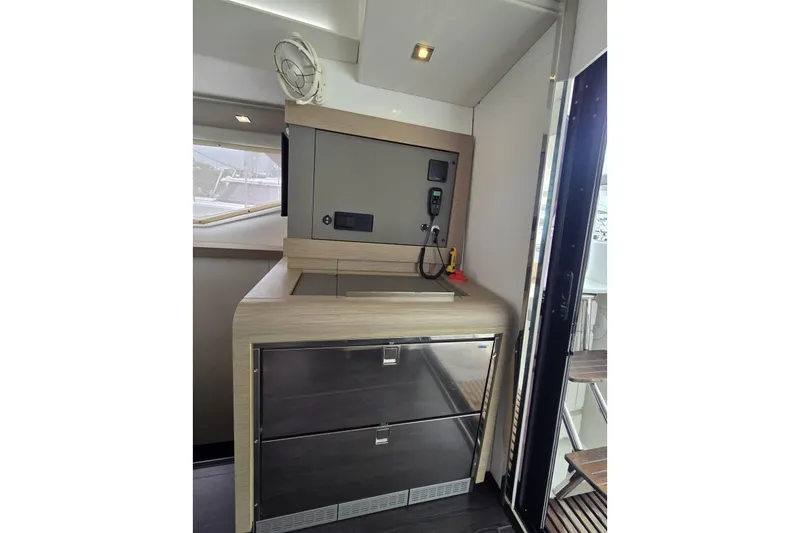 Free To Be Yacht Photos Pics Interior of 2022 Fountaine Pajot Elba 45 Catamaran, featuring modern cabinetry and appliances.