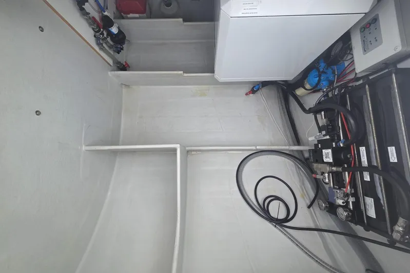 Free To Be Yacht Photos Pics 2022 Fountaine Pajot Elba 45 Catamaran engine room with equipment and wiring.