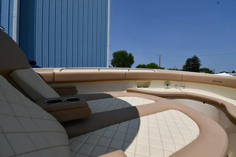  Yacht Photos Pics Luxurious seating on 2024 Chris-Craft Catalina 30 boat, featuring elegant beige upholstery.