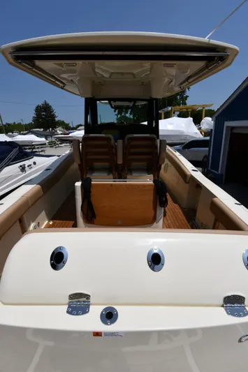  Yacht Photos Pics 2024 Chris-Craft Catalina 30 boat with sleek design and spacious seating.