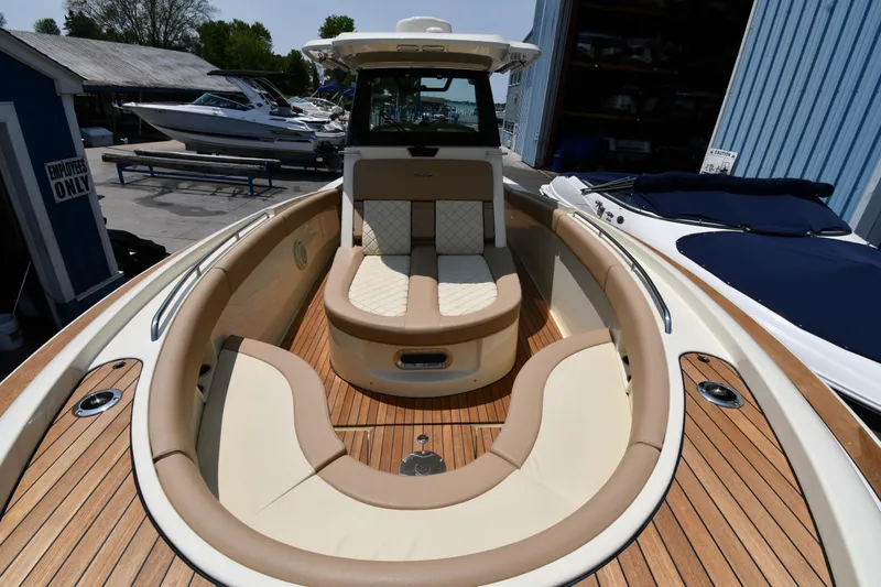  Yacht Photos Pics 2024 Chris-Craft Catalina 30 boat with luxurious seating and teak deck.