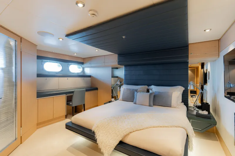 Renegade Yacht Photos Pics Luxurious 1992 Lloyds Ships Custom yacht bedroom with modern design and elegant furnishings.