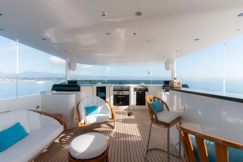 Renegade Yacht Photos Pics Luxurious 1992 Lloyds Ships Custom yacht deck with seating and ocean view.