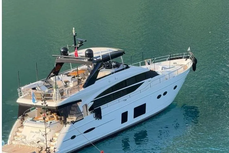  Yacht Photos Pics 2014 Princess Flybridge 82 Motor Yacht on tranquil water.