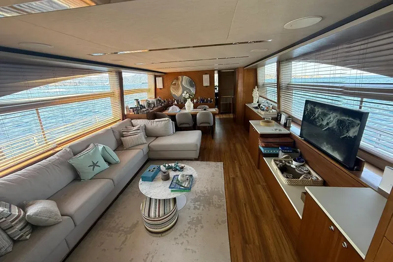  Yacht Photos Pics Luxurious interior of 2014 Princess Flybridge 82 Motor Yacht with elegant furnishings and panoramic windows.