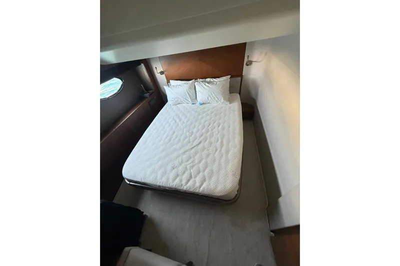  Yacht Photos Pics Luxurious bedroom interior of 2014 Princess Flybridge 82 Motor Yacht with elegant bedding.