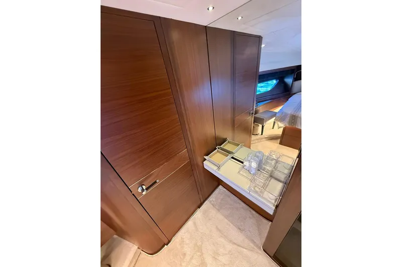  Yacht Photos Pics Luxurious interior of 2014 Princess Flybridge 82 Motor Yacht with wooden cabinetry and elegant design.