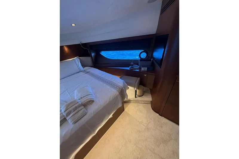  Yacht Photos Pics Luxurious bedroom interior of 2014 Princess Flybridge 82 Motor Yacht with ocean view.