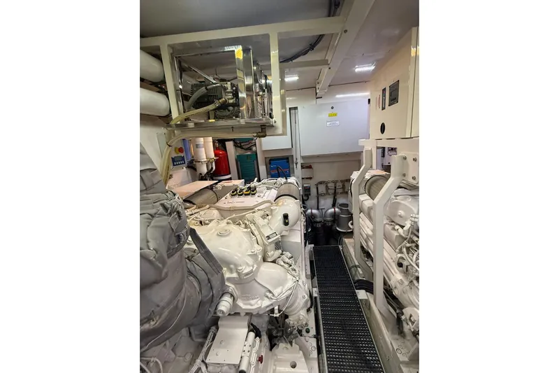  Yacht Photos Pics Engine room of 2014 Princess Flybridge 82 Motor Yacht, showcasing machinery and equipment.