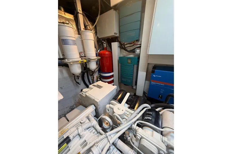  Yacht Photos Pics Engine room of 2014 Princess Flybridge 82 Motor Yacht with equipment and wiring.