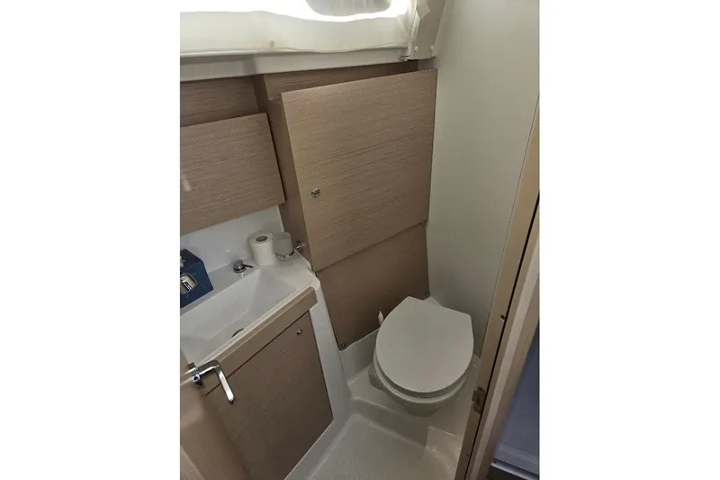 Bluebird Yacht Photos Pics 2023 Beneteau Oceanis 38.1 yacht bathroom with modern fixtures and compact design.
