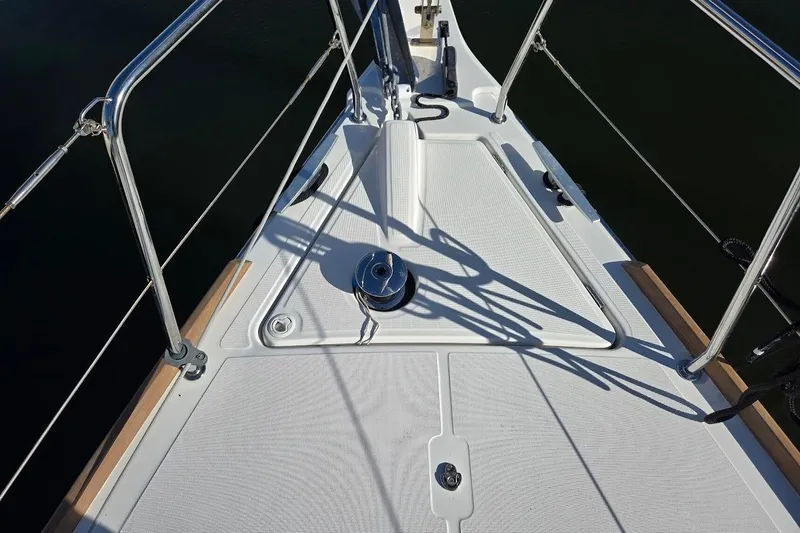Bluebird Yacht Photos Pics Deck view of 2023 Beneteau Oceanis 38.1 sailboat, featuring sleek design and stainless steel railings.