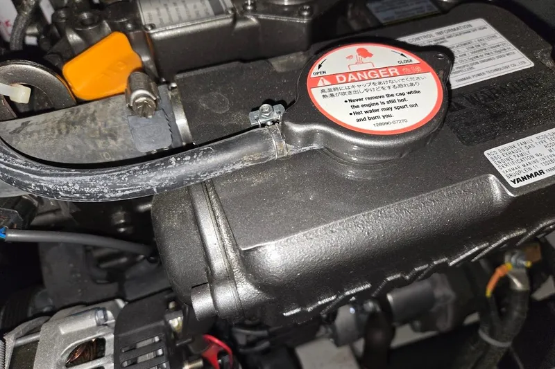 Bluebird Yacht Photos Pics Engine compartment of a 2023 Beneteau Oceanis 38.1 sailboat, featuring a Yanmar engine.