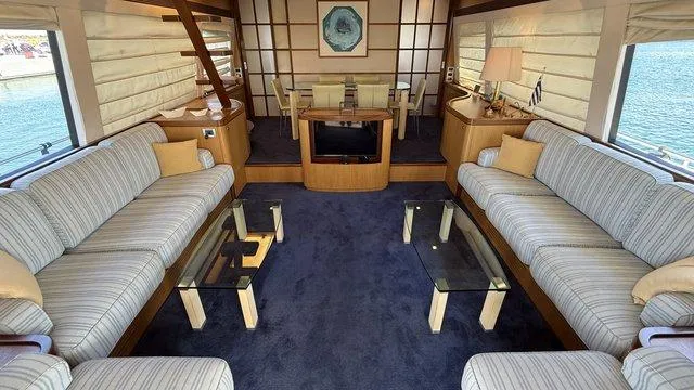 Happy Landing Yacht Photos Pics Luxurious interior of 2007 Ferretti Yachts 731 with elegant seating and modern decor.