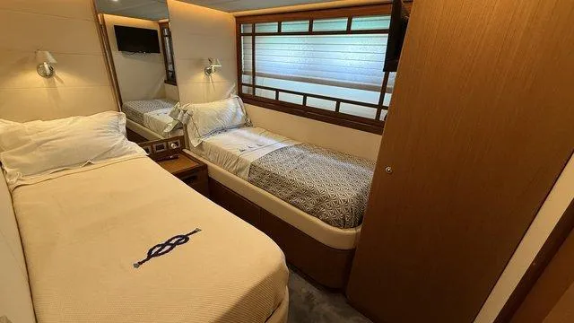 Happy Landing Yacht Photos Pics Luxurious twin cabin interior of 2007 Ferretti Yachts 731 with modern decor.