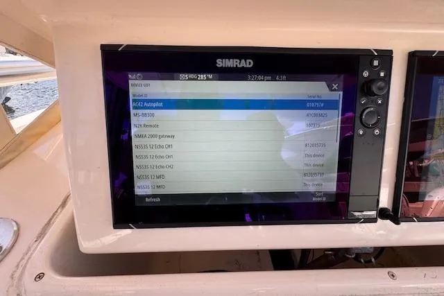  Yacht Photos Pics Simrad navigation display on 2007 Grady-White Bimini 306 boat dashboard.