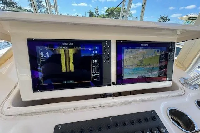  Yacht Photos Pics 2007 Grady-White Bimini 306 boat dashboard with dual Simrad navigation screens.