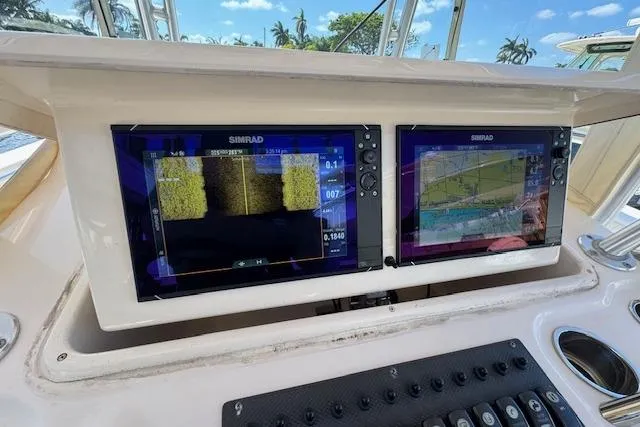  Yacht Photos Pics Dual Simrad displays on 2007 Grady-White Bimini 306 boat dashboard.