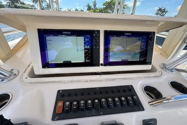  Yacht Photos Pics Control panel of 2007 Grady-White Bimini 306 boat with dual Simrad displays.